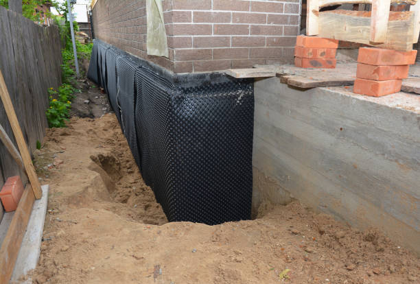 Happy homeowners after waterproofing job in Kenvil